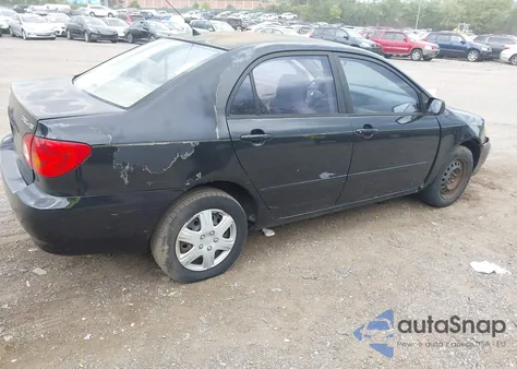 2004 Toyota Corolla Le z USA, uszkodzony, nr VIN JTDBR32E340052883